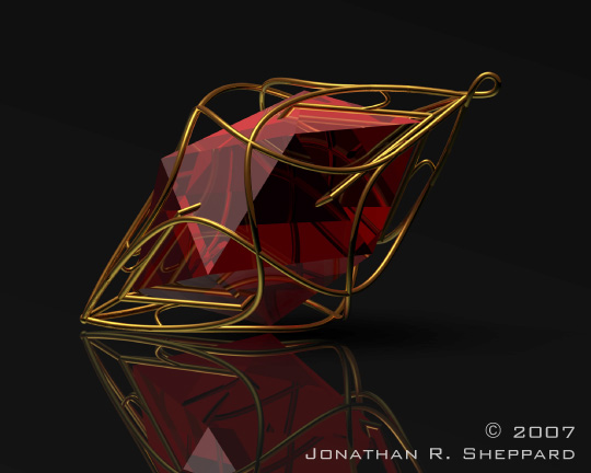 A blood-red jewel in a sinster yet beautiful cage of gold wire.
