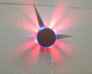 Radiant clock final model, head-on view, lit room